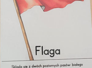 na kartce wydrukowana powiewająca flaga Polski, a pod spodem jej opis
